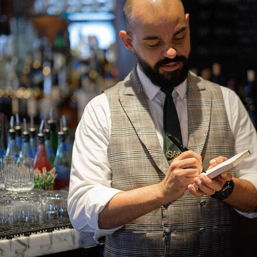 S&W waiter is taking notes
